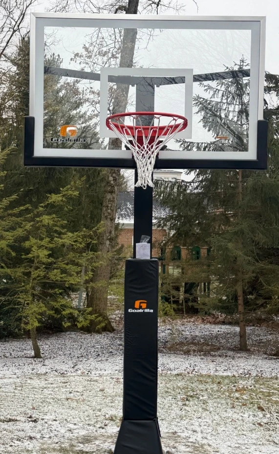 Goalrilla FT72 regulation 72-inch in-ground basketball hoop featuring a pro-style glass backboard and rock-solid steel pole.